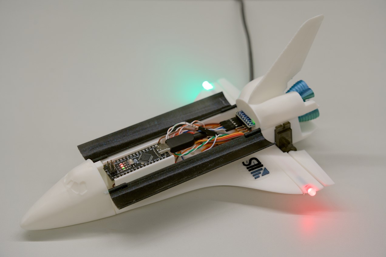 A blinking mini-spaceshuttle
